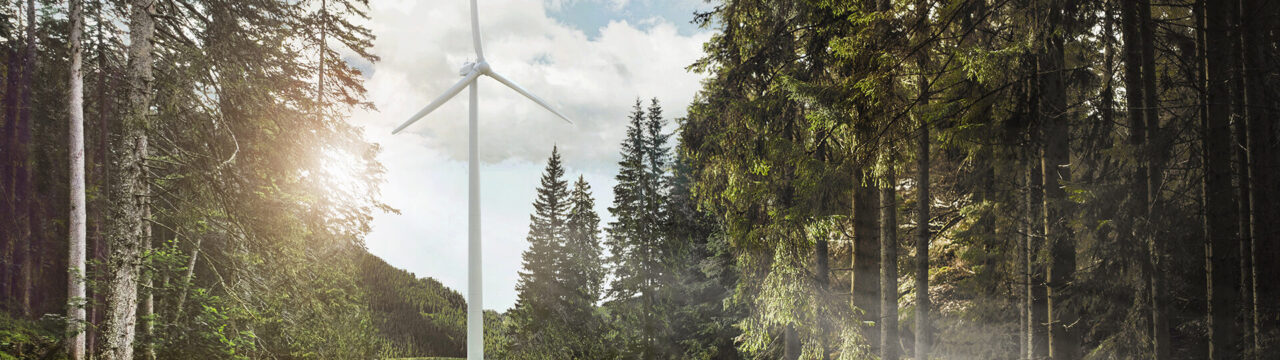 Wind turbine in the forest and light beams